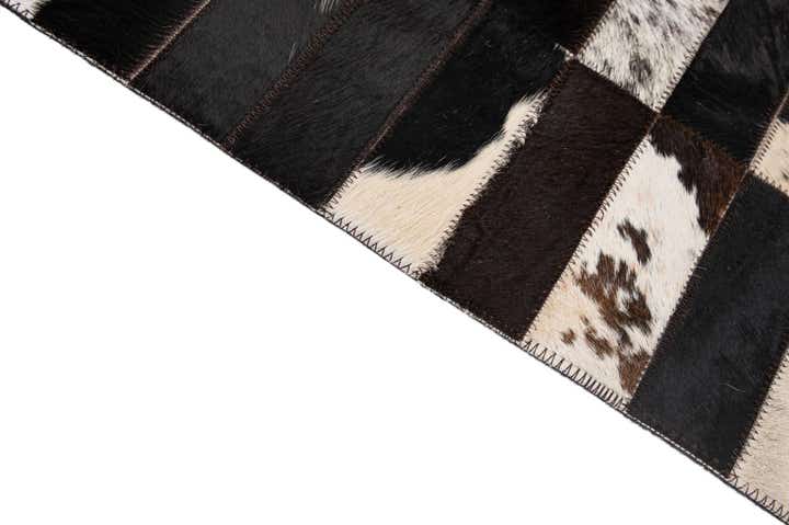 4' 11 x 7' 11 Cowhide - Patchwork Rug