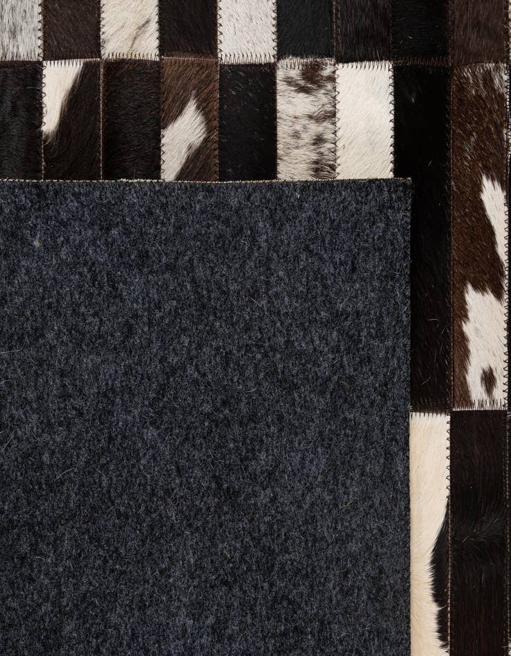Detail image of 4' 11 x 7' 11 Cowhide - Patchwork Rug