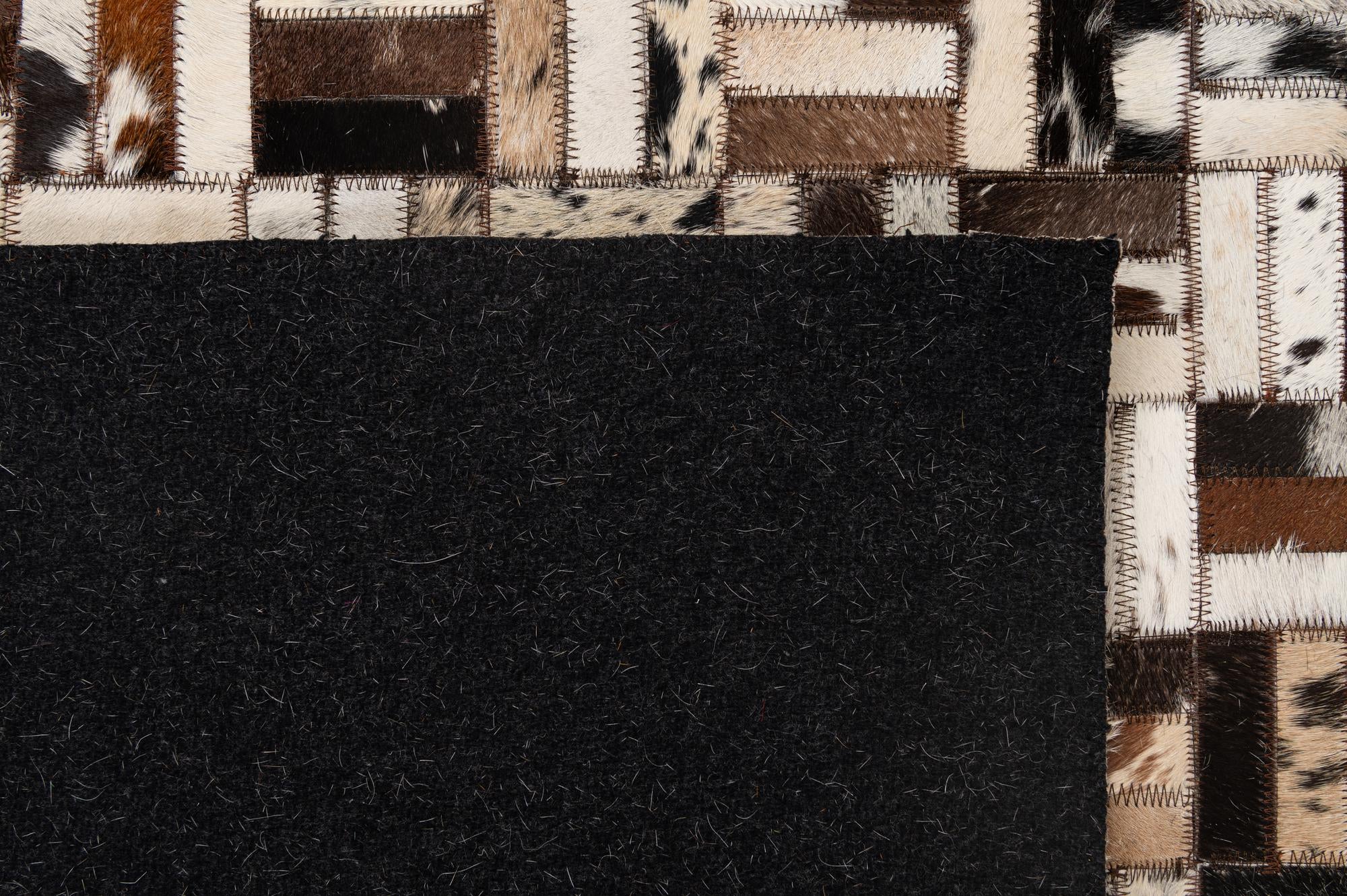 5' 1 x 8' Cowhide - Patchwork Rug