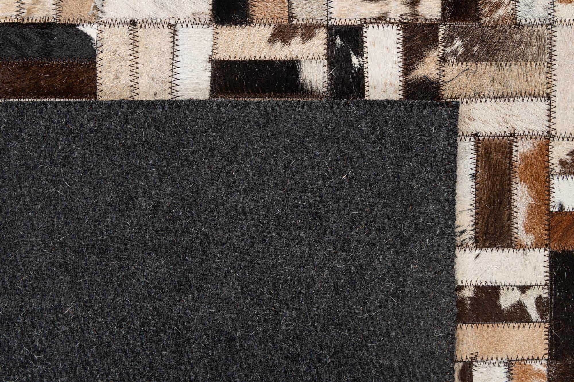 4' 11 x 7' 11 Cowhide - Patchwork Rug