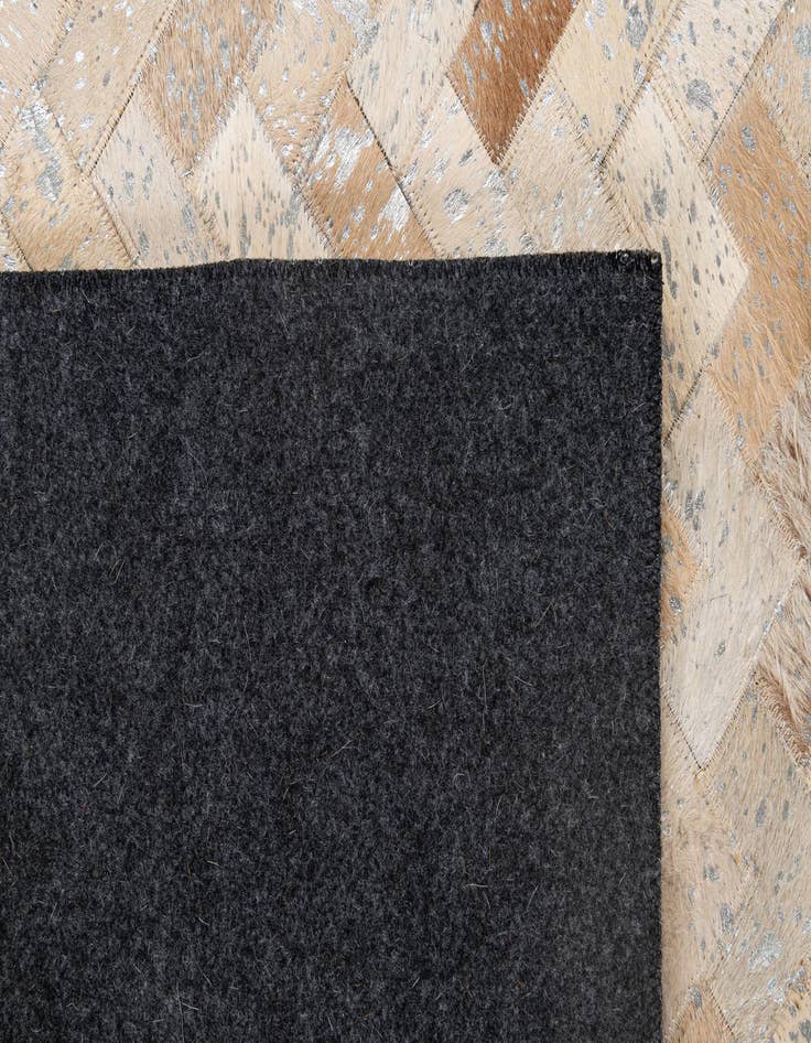 Detail image of 5' x 7' 11 Cowhide - Patchwork Rug