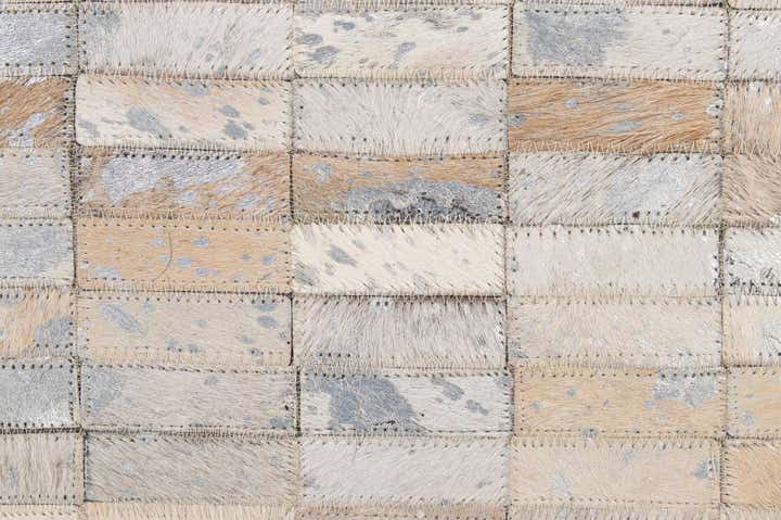4' 11 x 8' 1 Cowhide - Patchwork Rug