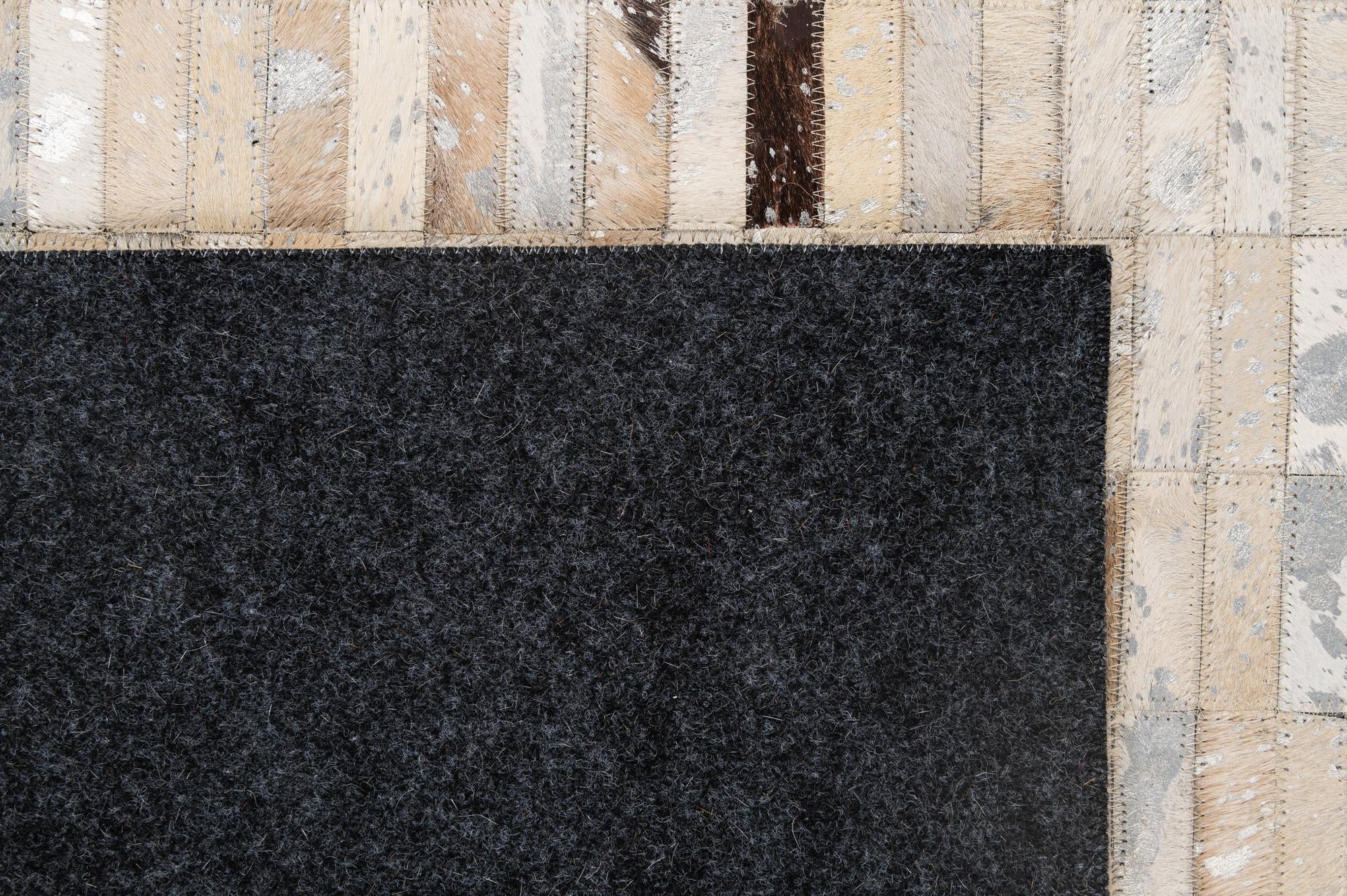 4' 11 x 8' 1 Cowhide - Patchwork Rug