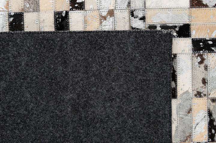 5' 1 x 7' 11 Cowhide - Patchwork Rug