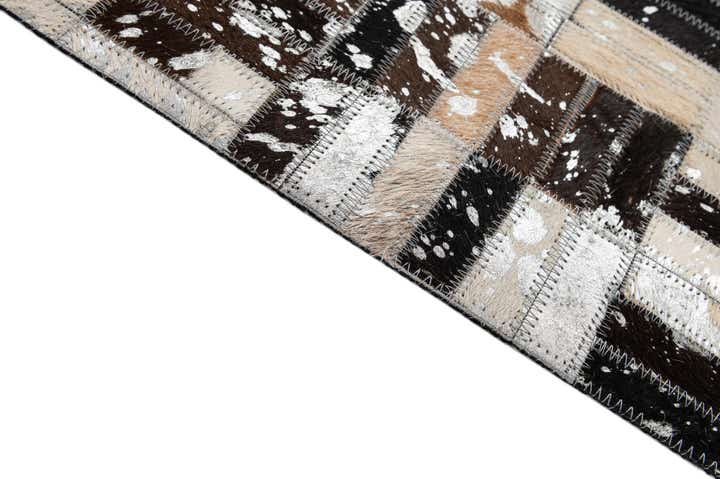 4' 11 x 7' 10 Cowhide - Patchwork Rug
