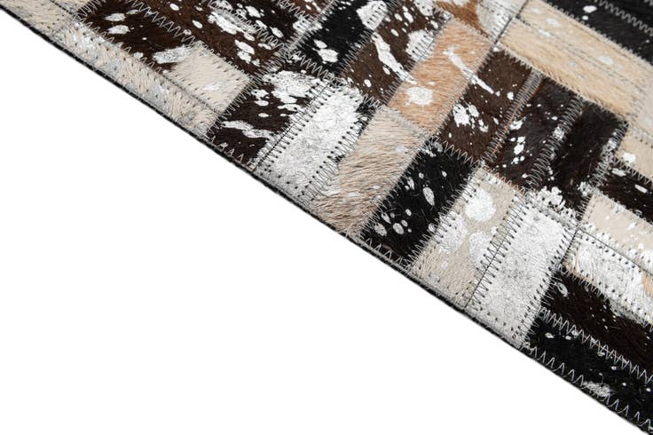 Detail image of 4' 11 x 7' 10 Cowhide - Patchwork Rug