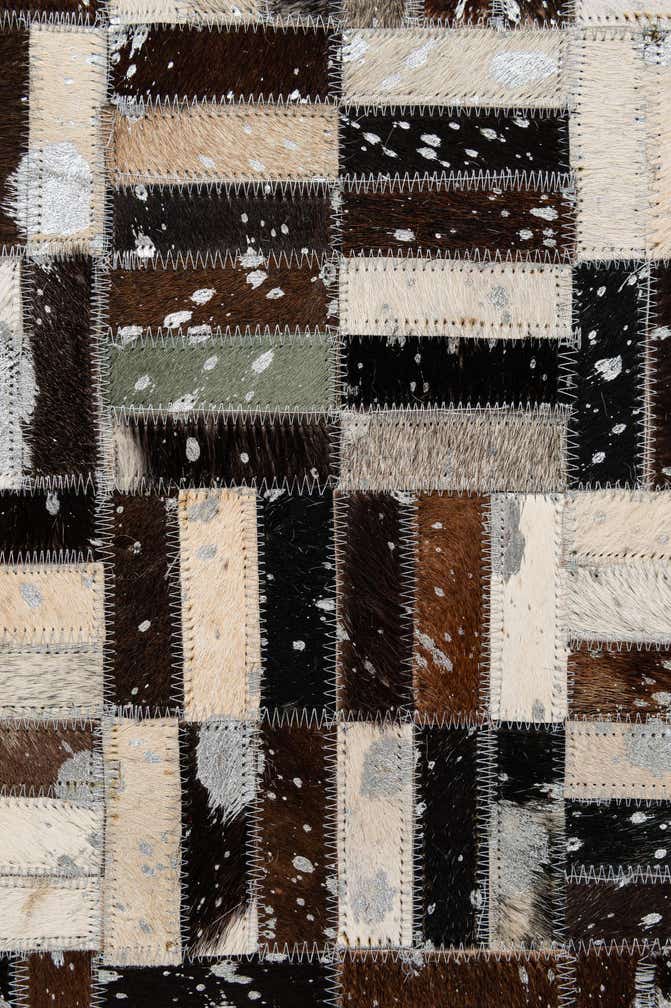 4' 11 x 7' 10 Cowhide - Patchwork Rug