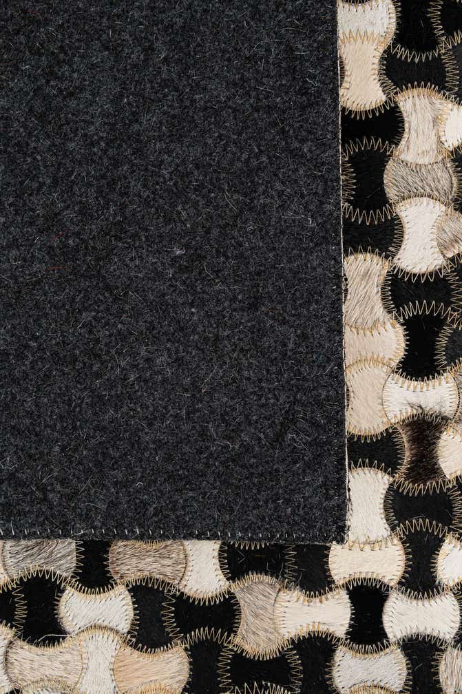 5' 1 x 7' 11 Cowhide - Patchwork Rug