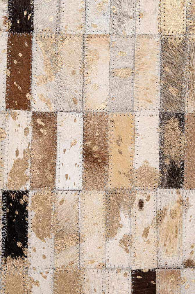 5' 3 x 8' 1 Cowhide - Patchwork Rug