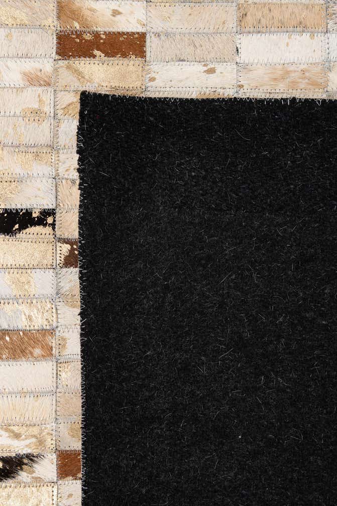 5' 3 x 8' 1 Cowhide - Patchwork Rug