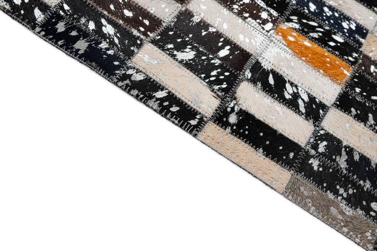 Detail image of 5' 2 x 8' 2 Cowhide - Patchwork Rug