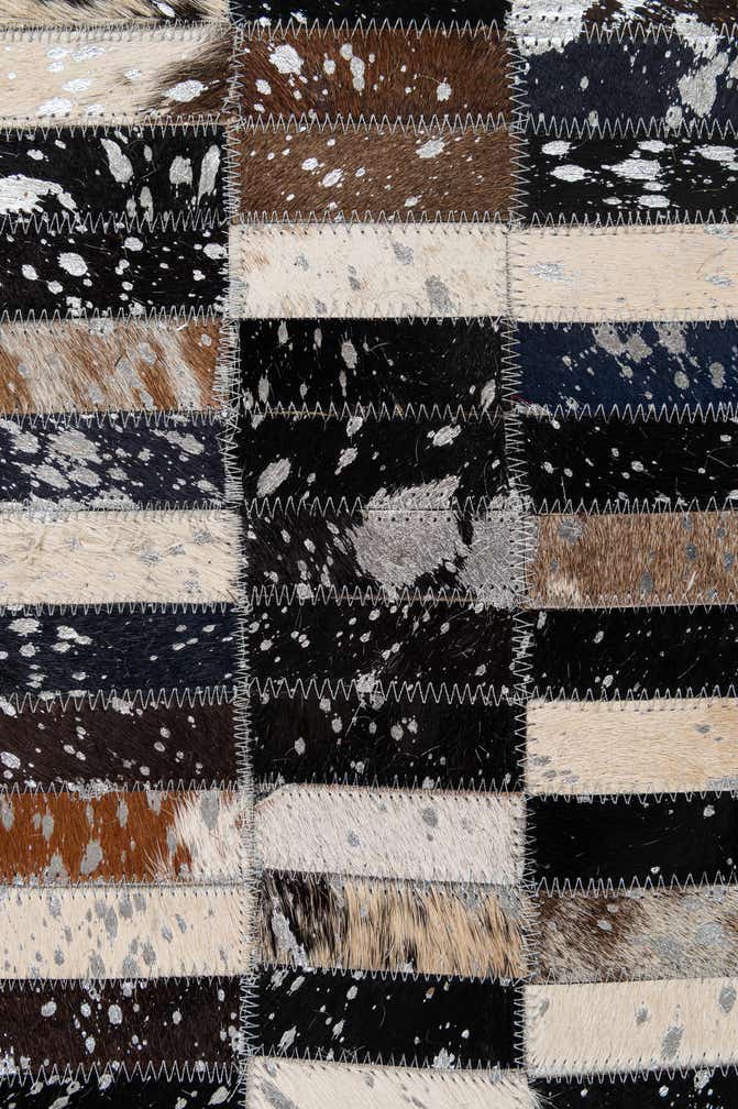 5' 2 x 8' 2 Cowhide - Patchwork Rug