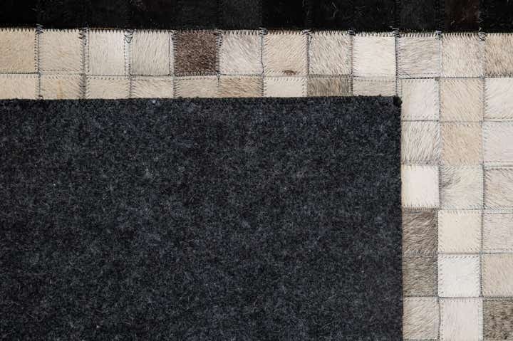 5' 2 x 8' 2 Cowhide - Patchwork Rug
