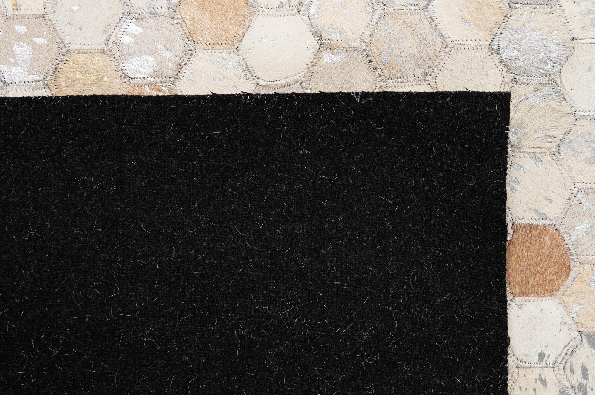 5' 2 x 8' 2 Cowhide - Patchwork Rug