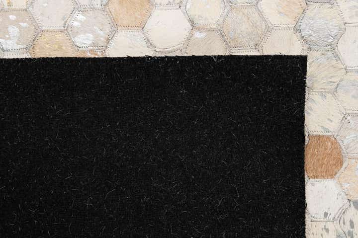 5' 2 x 8' 2 Cowhide - Patchwork Rug