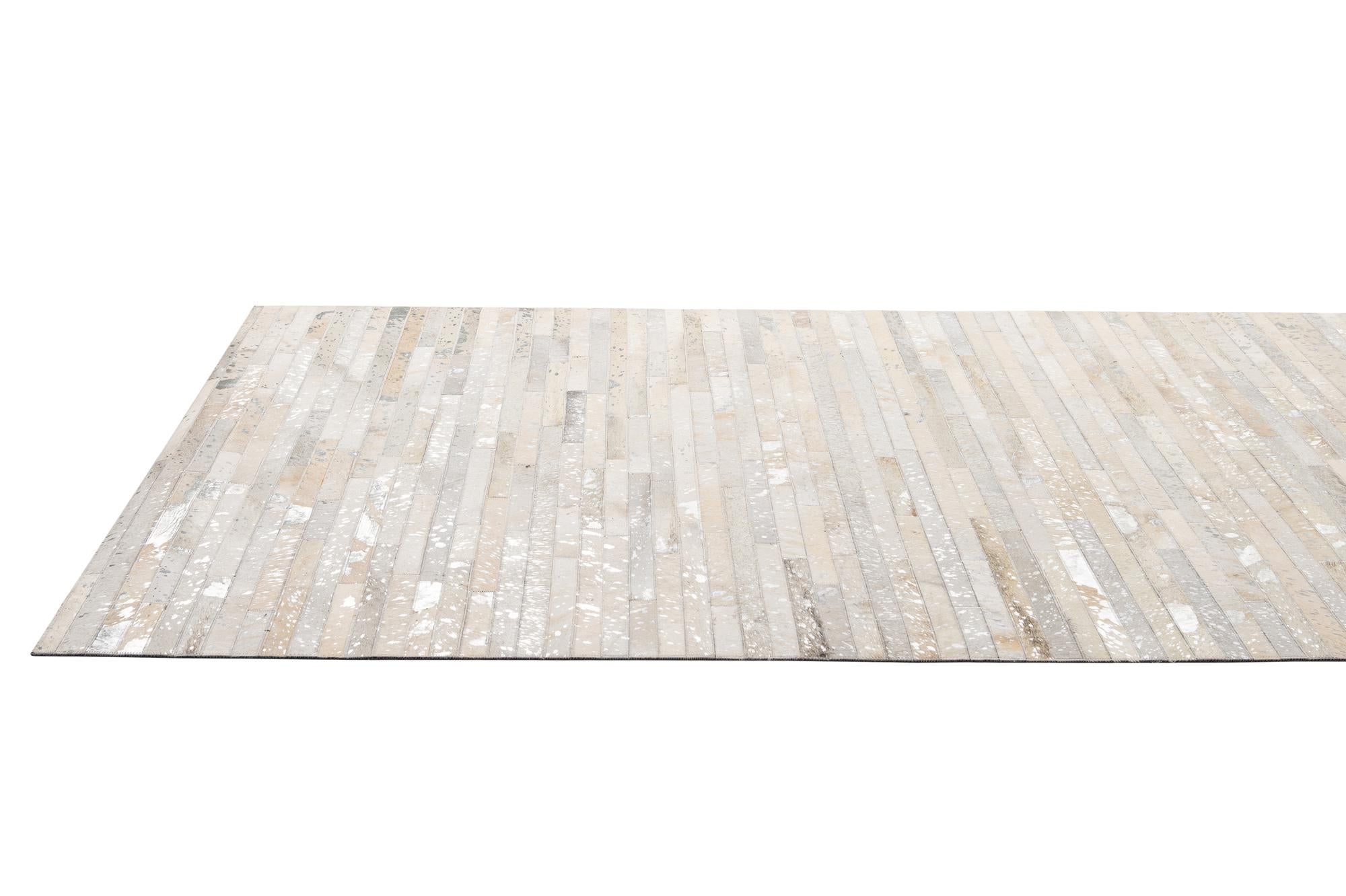 5' 2 x 7' 11 Cowhide - Patchwork Rug