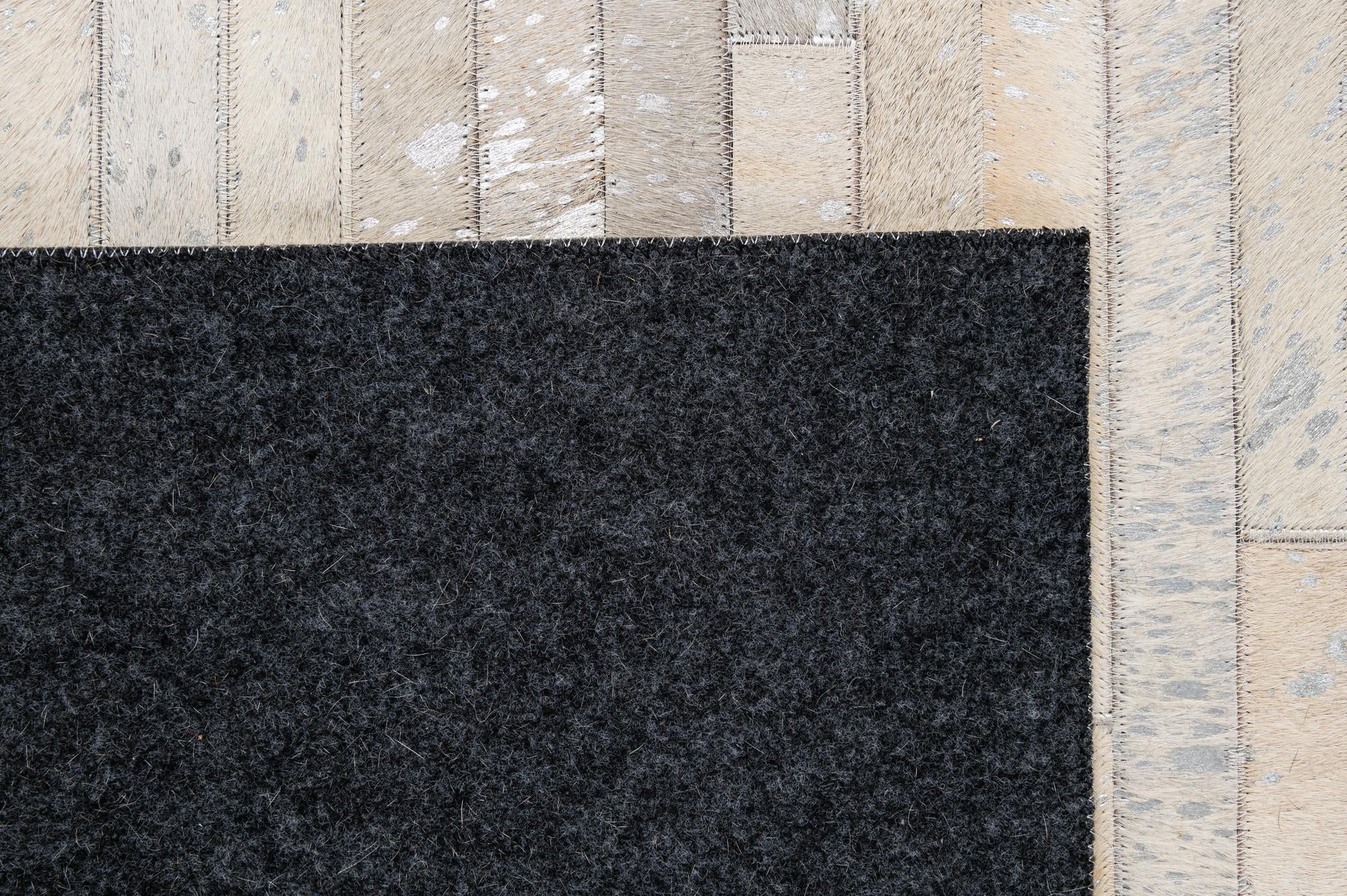 5' 2 x 7' 11 Cowhide - Patchwork Rug