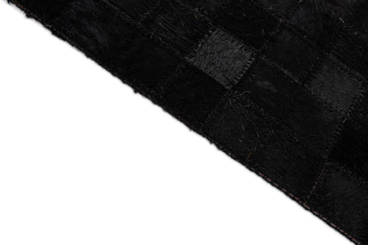Detail image of 5' 1 x 7' 11 Cowhide - Patchwork Rug
