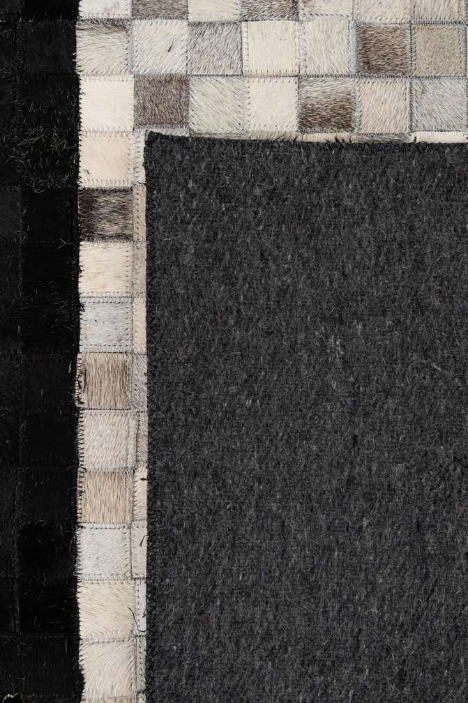 5' 1 x 7' 11 Cowhide - Patchwork Rug