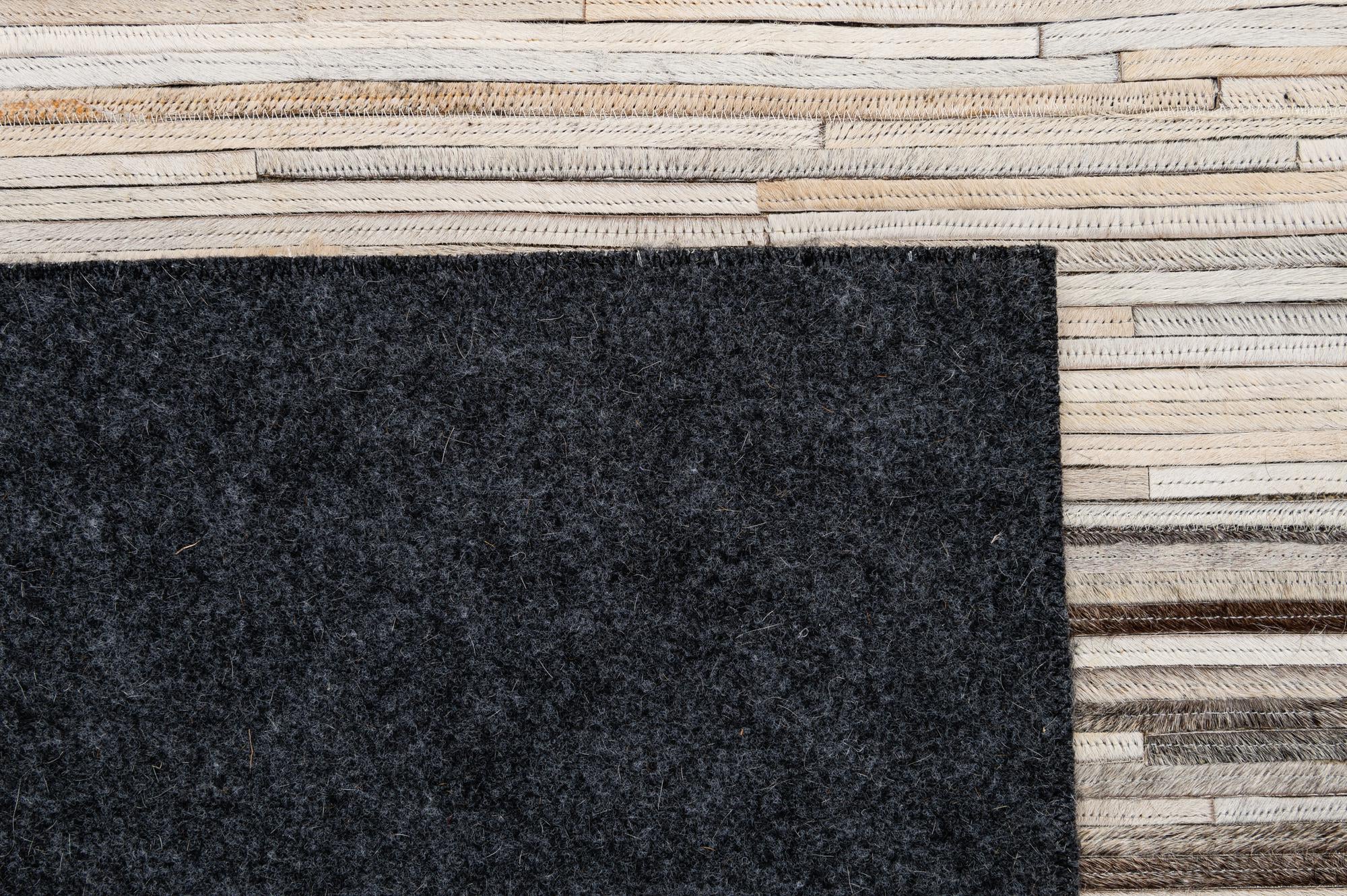 5' 1 x 7' 11 Cowhide - Patchwork Rug