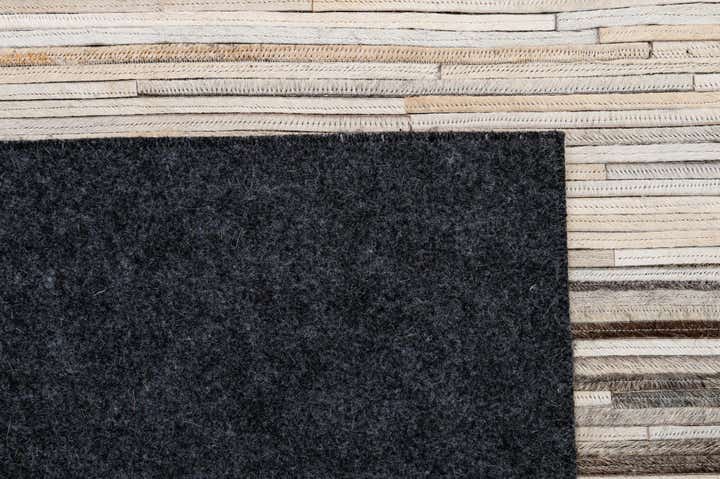 5' 1 x 7' 11 Cowhide - Patchwork Rug