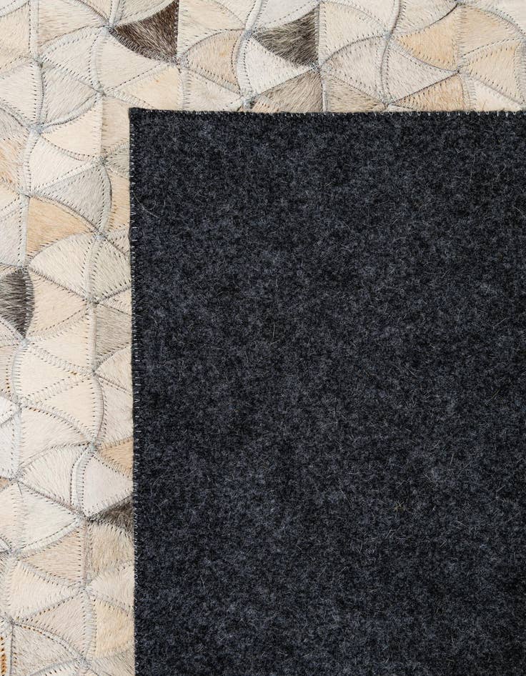 Detail image of 4' 10 x 7' 11 Cowhide - Patchwork Rug