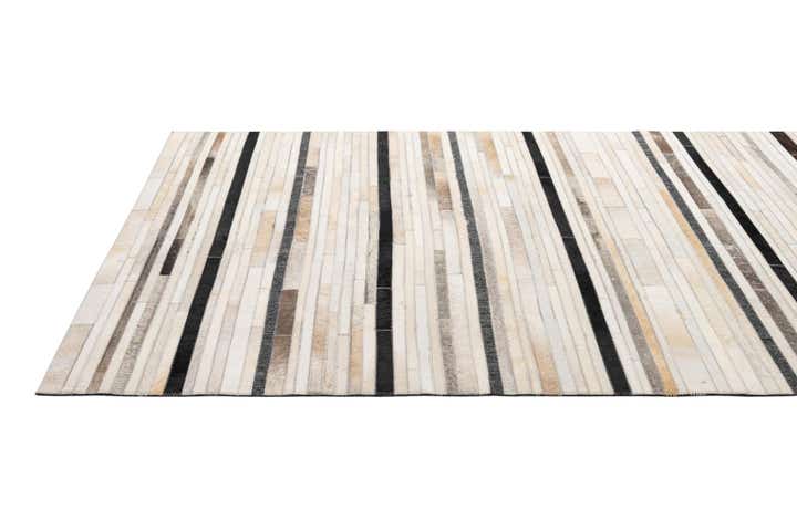 5' 2 x 8' 1 Cowhide - Patchwork Rug