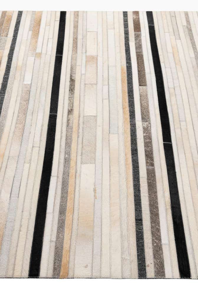 5' 2 x 8' 1 Cowhide - Patchwork Rug