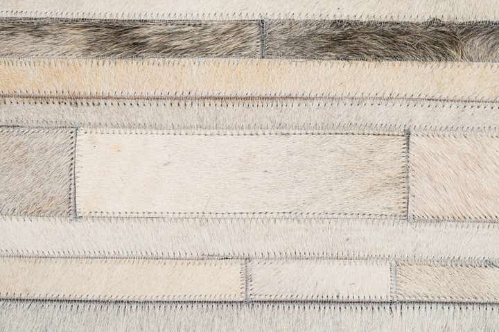 5' 2 x 8' 1 Cowhide - Patchwork Rug