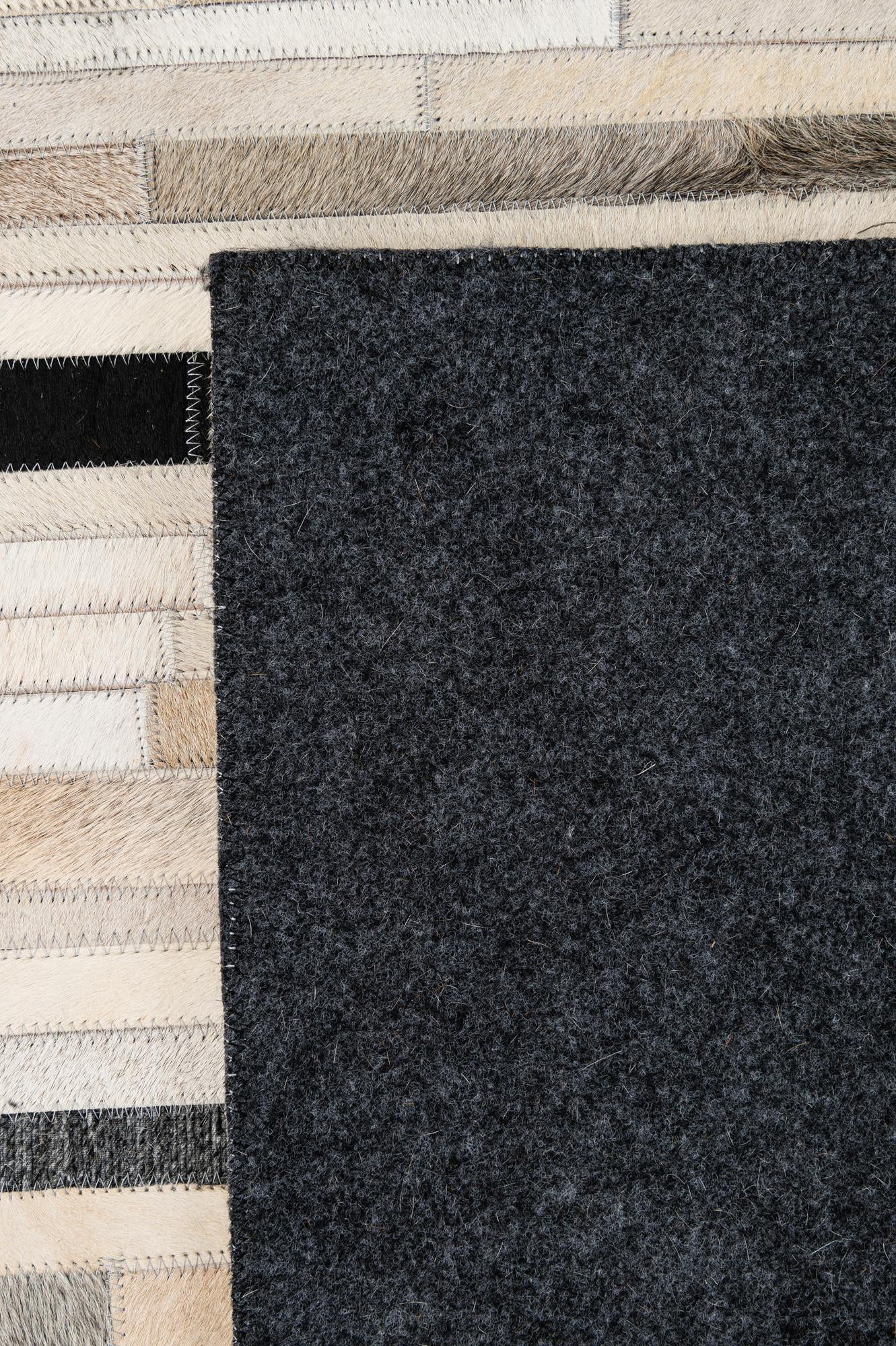 5' 2 x 8' 1 Cowhide - Patchwork Rug