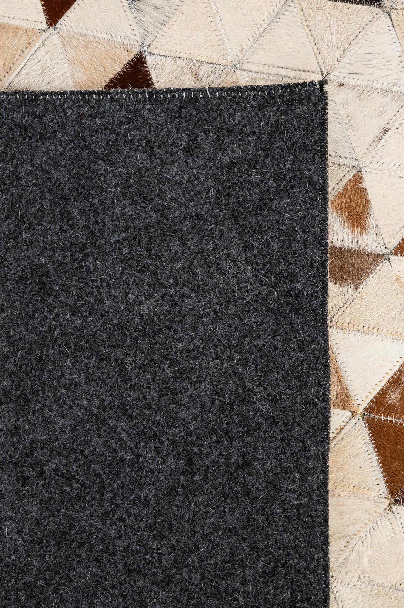 5' 1 x 7' 11 Cowhide - Patchwork Rug