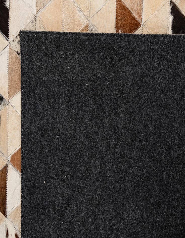 Detail image of 5' 1 x 7' 11 Cowhide - Patchwork Rug