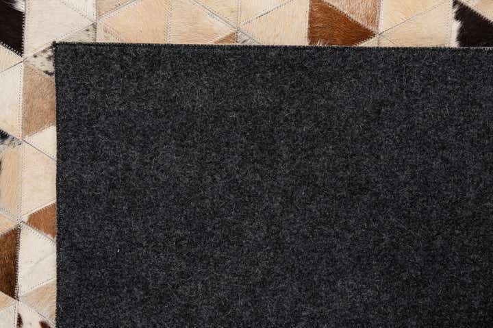 5' 1 x 7' 11 Cowhide - Patchwork Rug