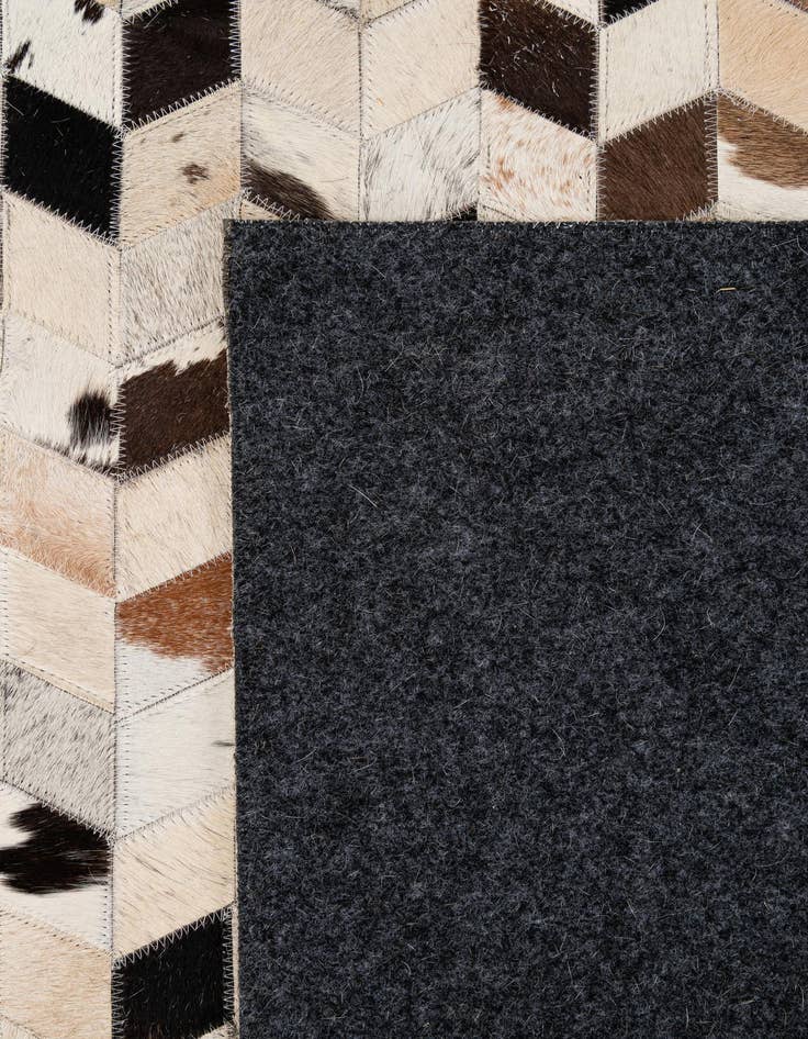 Detail image of 5' 1 x 7' 10 Cowhide - Patchwork Rug