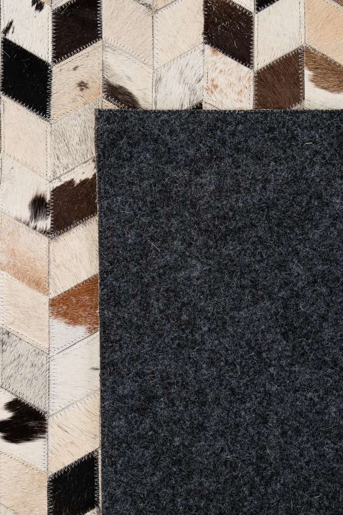 5' 1 x 7' 10 Cowhide - Patchwork Rug