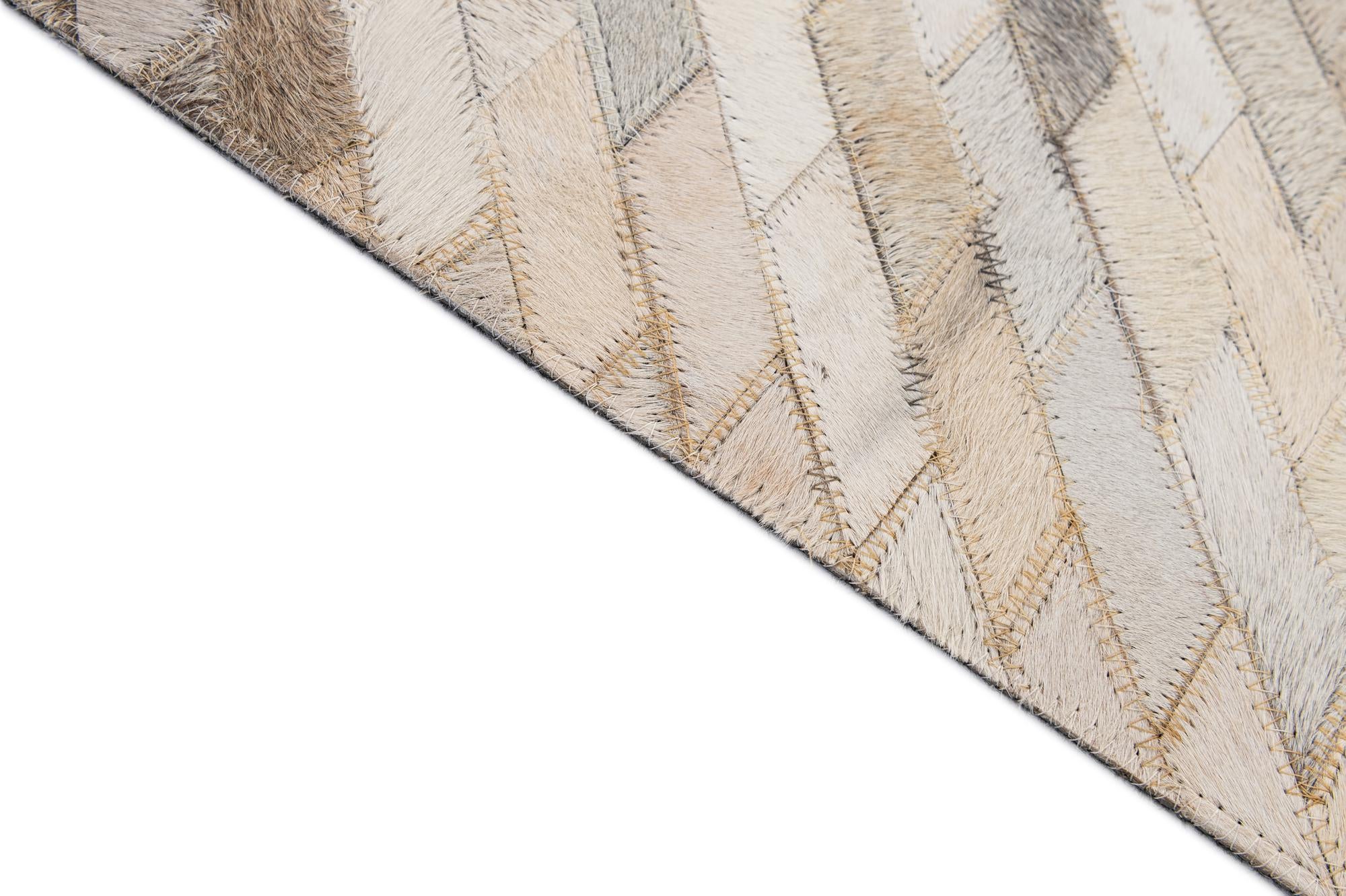 5' 1 x 7' 11 Cowhide - Patchwork Rug