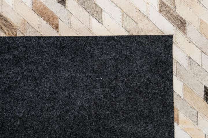 5' 1 x 7' 11 Cowhide - Patchwork Rug