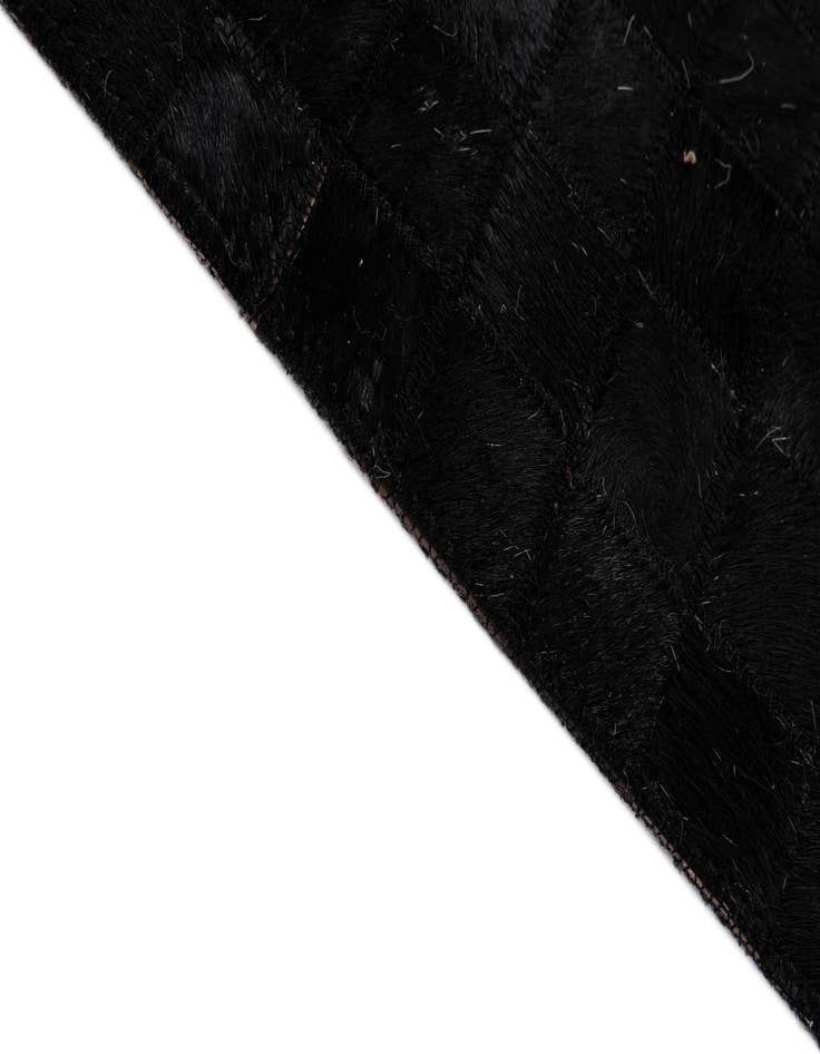 Detail image of 5' x 7' 11 Cowhide - Patchwork Rug