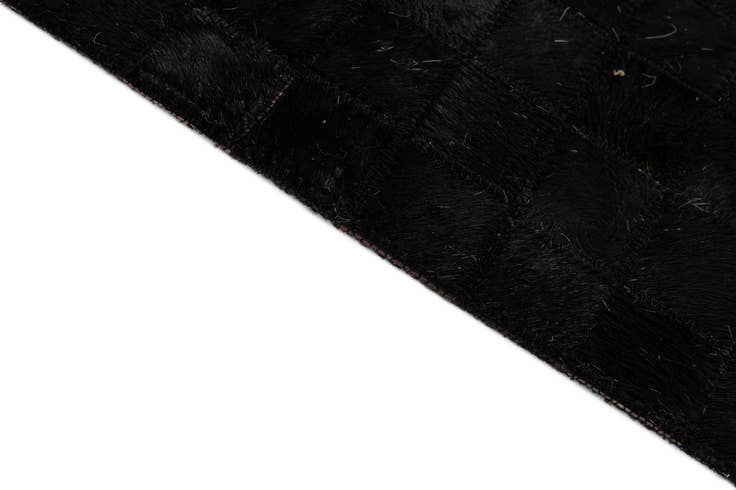 Detail image of 5' x 7' 11 Cowhide - Patchwork Rug