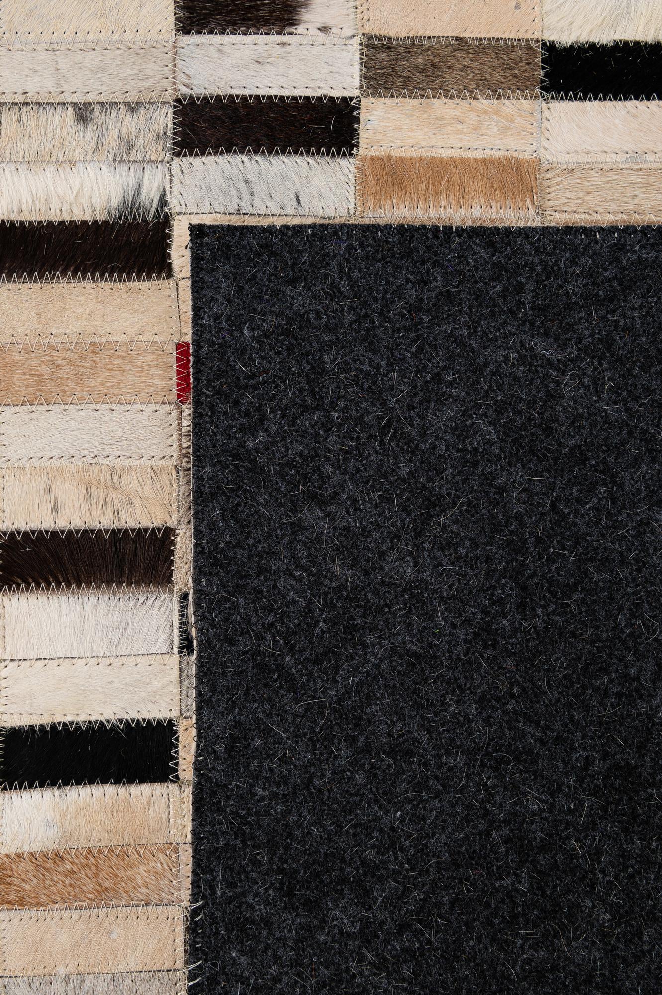 5' 2 x 7' 11 Cowhide - Patchwork Rug