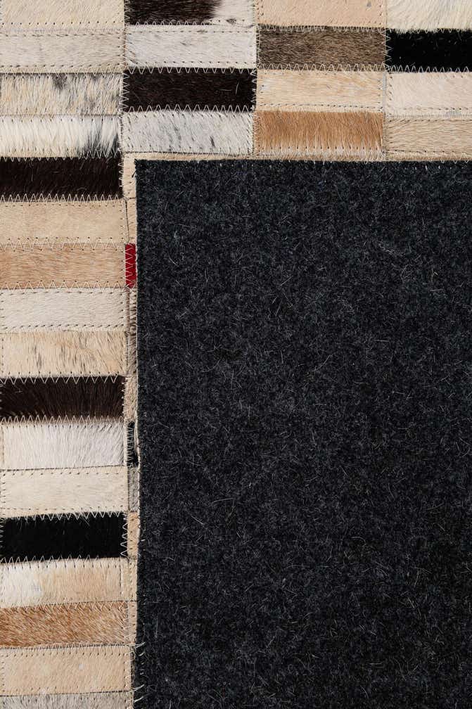5' 2 x 7' 11 Cowhide - Patchwork Rug