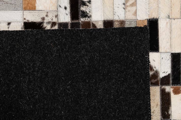 Detail image of 5' x 7' 11 Cowhide - Patchwork Rug