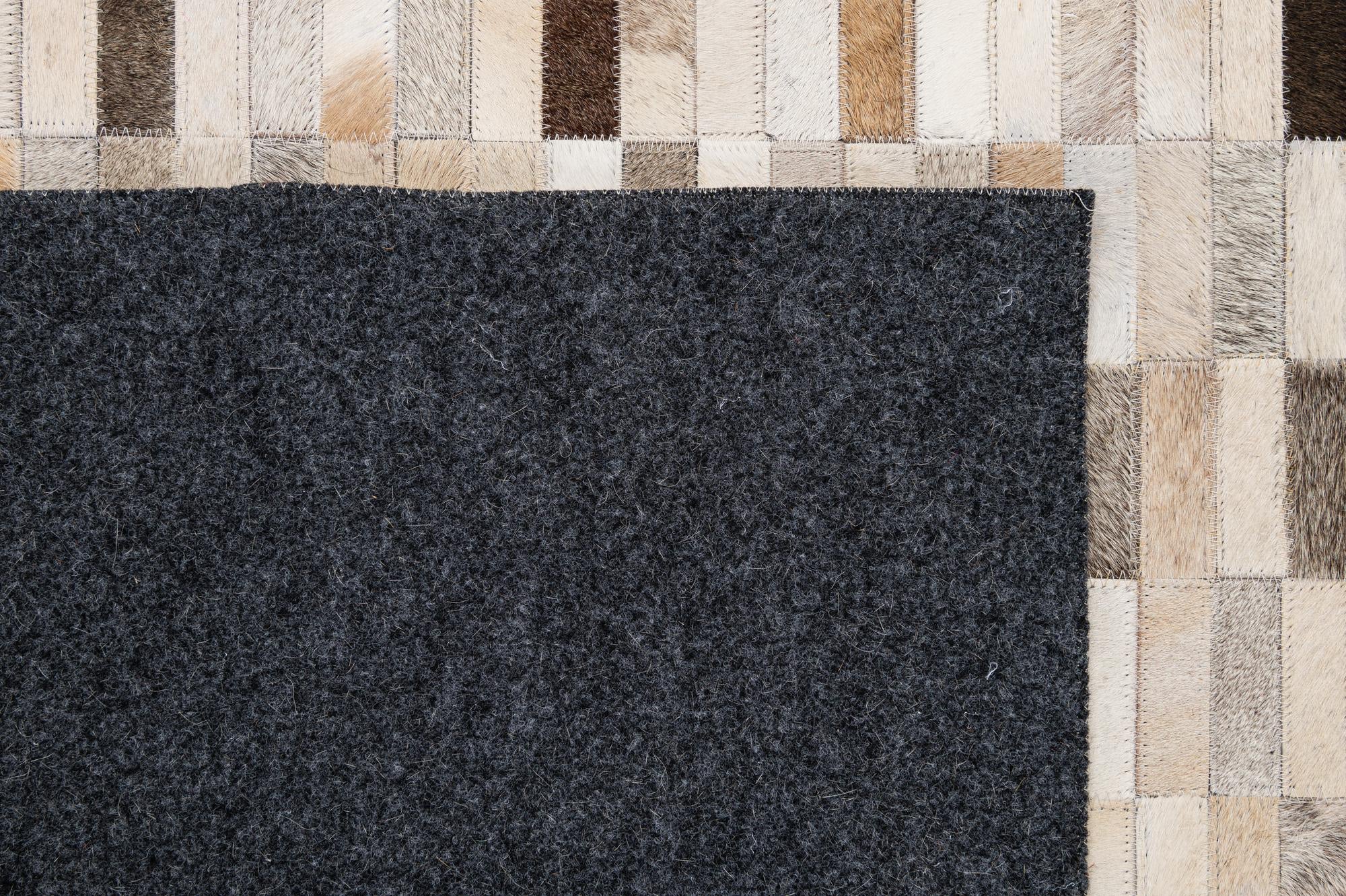 5' 2 x 7' 11 Cowhide - Patchwork Rug