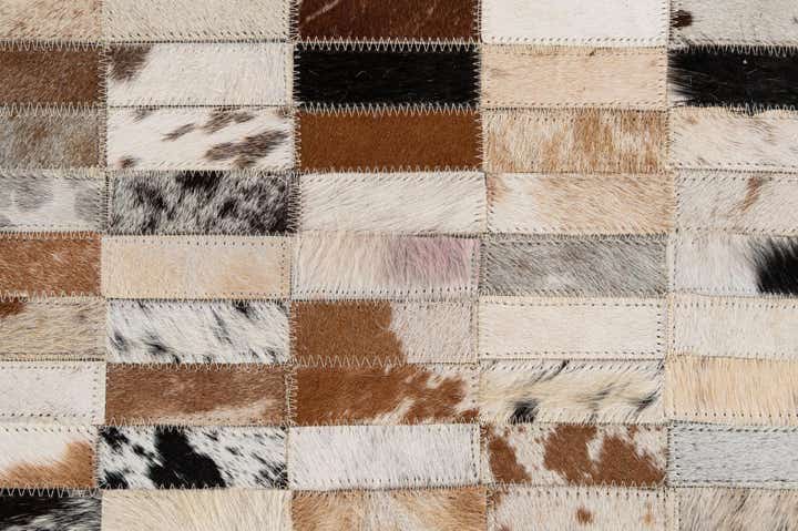 5' 3 x 8' 2 Cowhide - Patchwork Rug