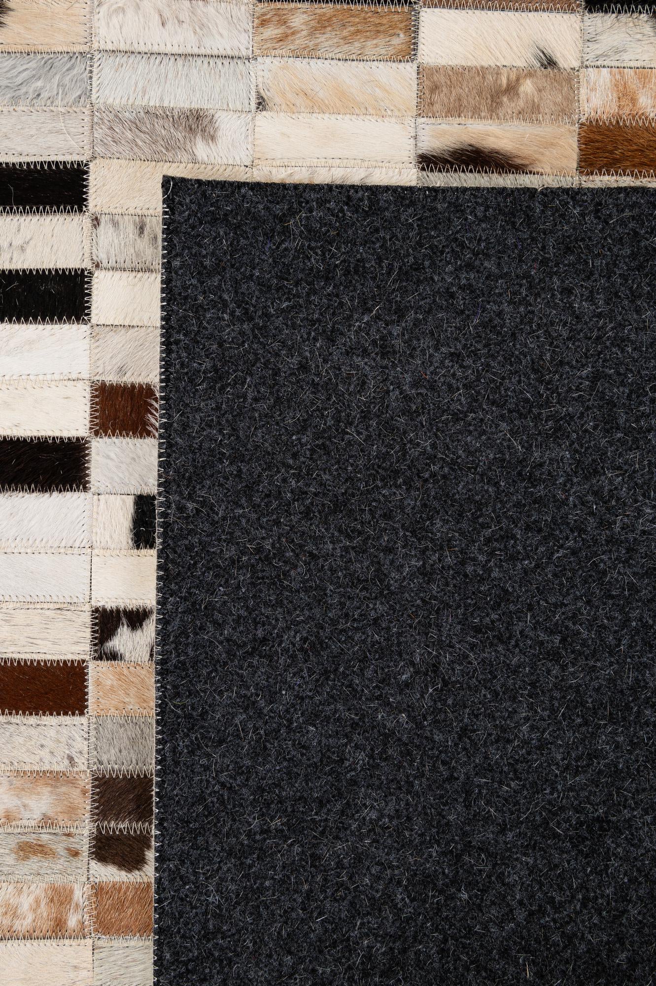 5' 3 x 8' 2 Cowhide - Patchwork Rug