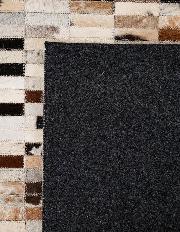 Detail image of 5' 3 x 8' 2 Cowhide - Patchwork Rug