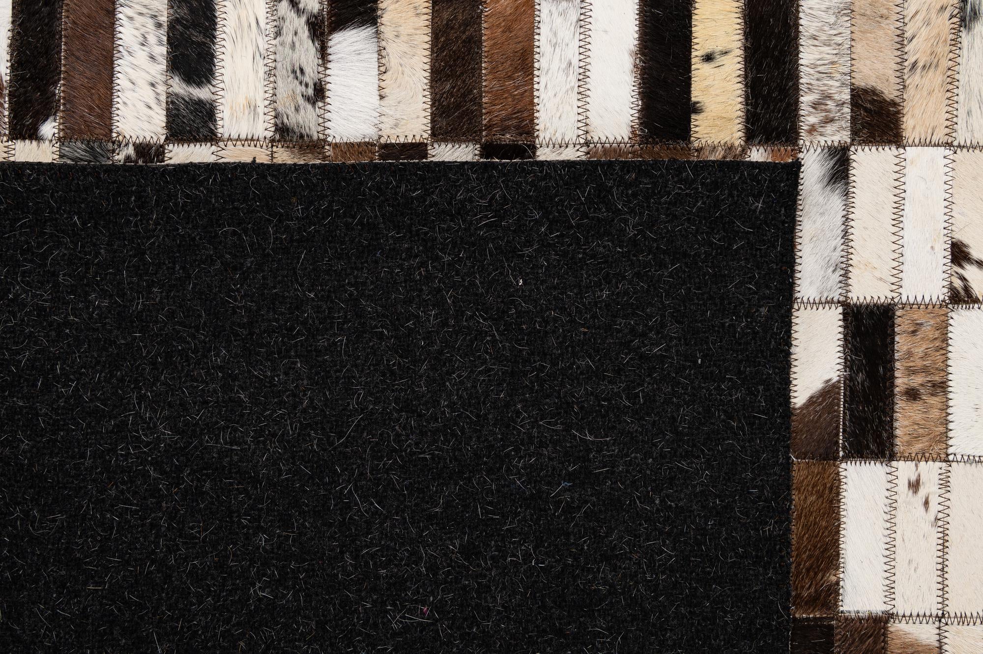 5' 3 x 8' Cowhide - Patchwork Rug