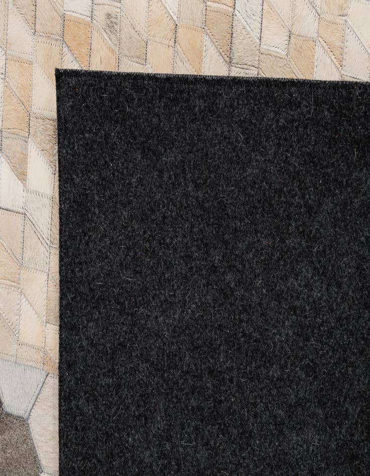 Detail image of 5' 2 x 8' 1 Cowhide - Patchwork Rug