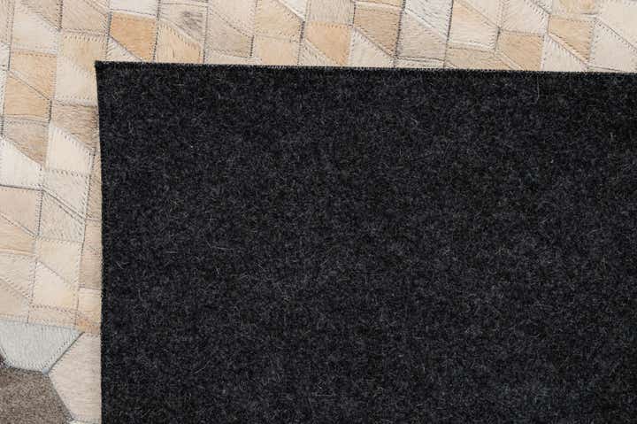 5' 2 x 8' 1 Cowhide - Patchwork Rug