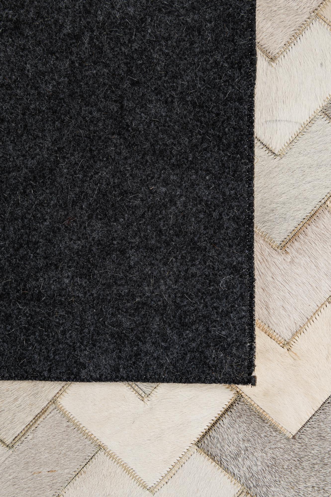 5' 2 x 7' 11 Cowhide - Patchwork Rug